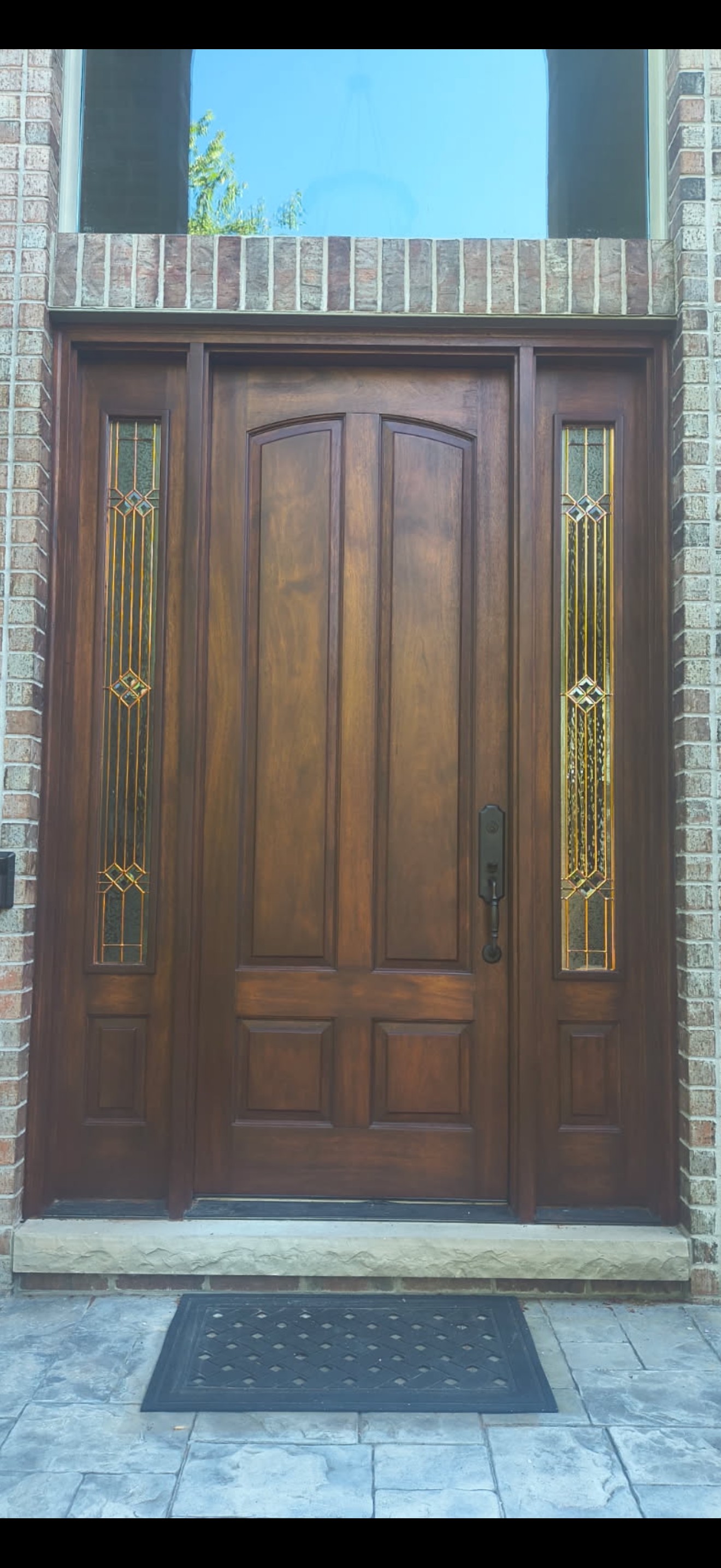 Restored front door with decorative side glass